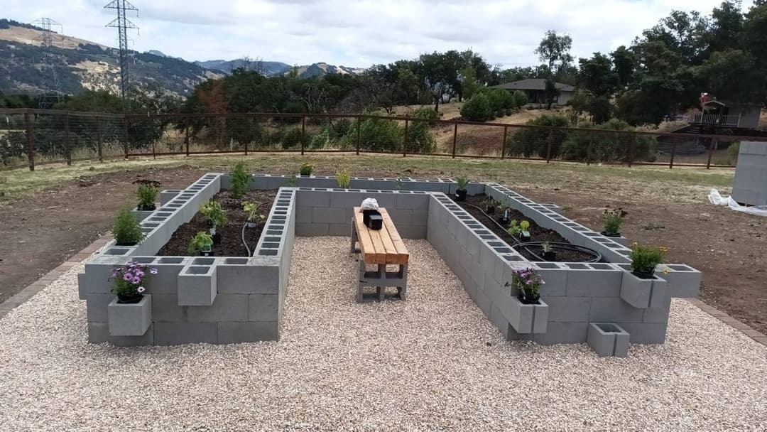 picture of a newly built bench and retaining wall