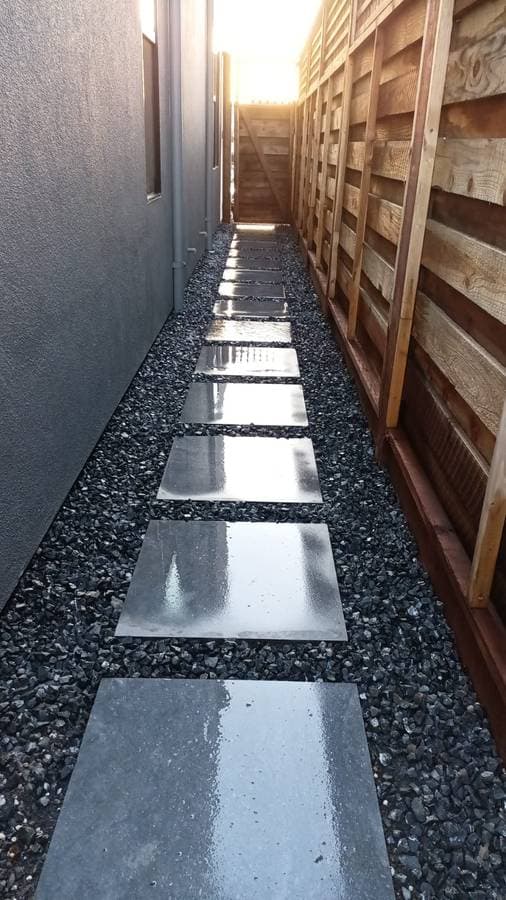 picture of luxury paver walkway at the side of a home
